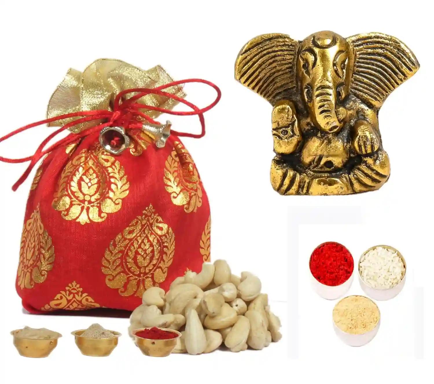 Bhaiya dooj gift set for brother/bhai dooj gift for brother/bhai dooj gift/bhai dooj gift set/bhaiya dooj roli chawal for brother-potli of cashew+metal ganesha idol+roli chawal chandan